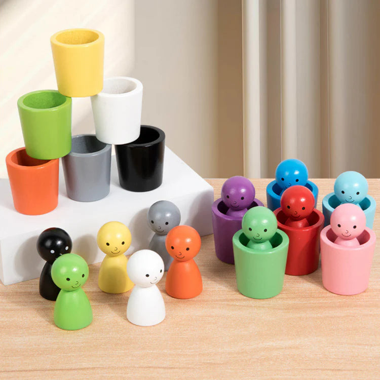 Jeu de tasses Montessori en bois permettant le tri des couleurs et l empilage pour developper la motricite fine