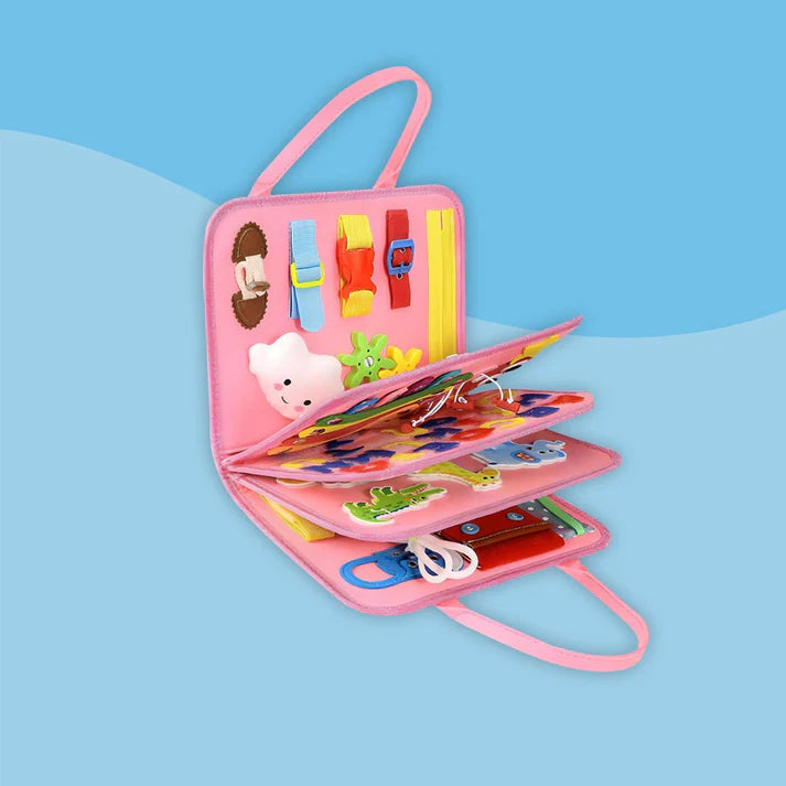 Valisette d’activités Montessori rose ouverte avec jeux éducatifs et activités de motricité fine